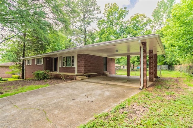 4078 Bouldercrest Rd, Ellenwood, GA 30294 - single story home with driveway, brick siding, and a carport