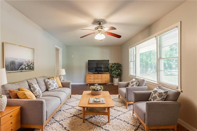 4078 Bouldercrest Rd, Ellenwood, GA 30294 - living room with ceiling fan, wood finished floors, and baseboards