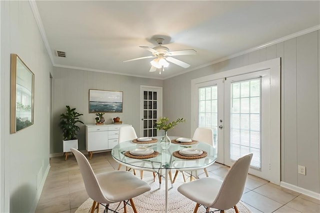 4078 Bouldercrest Rd, Ellenwood, GA 30294 - dining area with ornamental molding, french doors, ceiling fan, light tile patterned floors, and baseboards