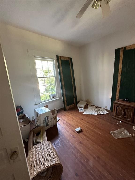 bedroom with ceiling fan and wood finished floors