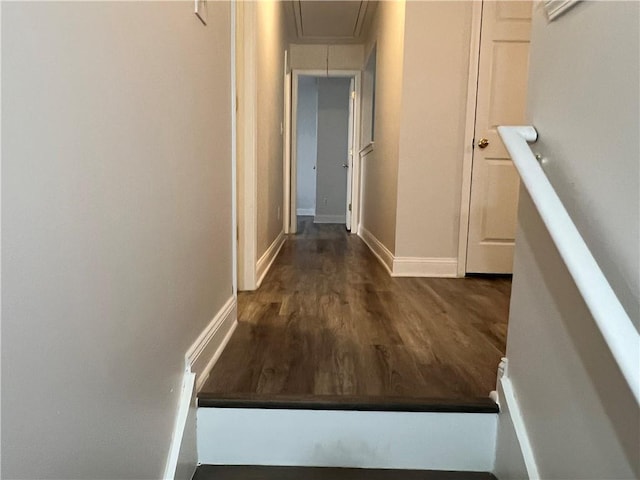 2682 Field Spring Dr, Lithonia, GA 30058 - hallway with attic access, dark wood-style floors, and baseboards