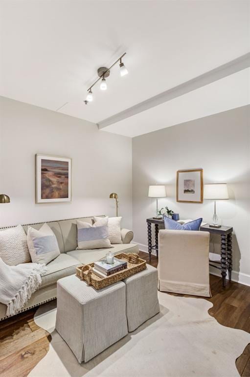 325 E Paces Ferry Rd NE Unit 410, Atlanta, GA 30305 - living room with baseboards, rail lighting, and wood finished floors