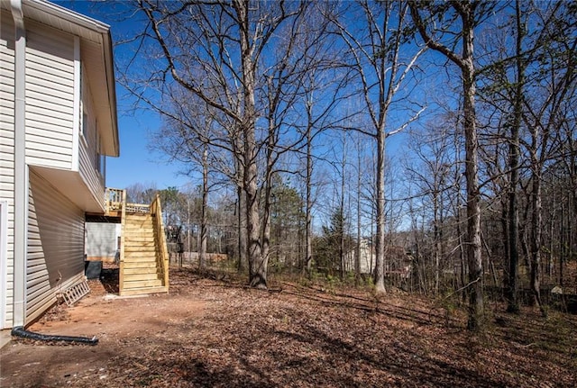 view of yard featuring stairs