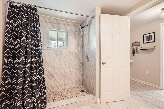 bathroom featuring walk in shower