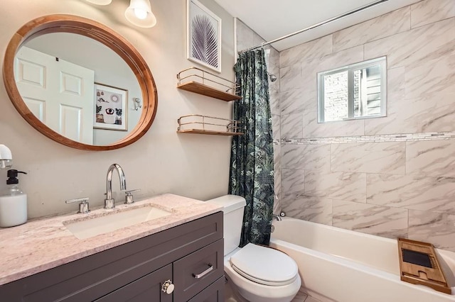 full bathroom with shower / bath combo, vanity, and toilet