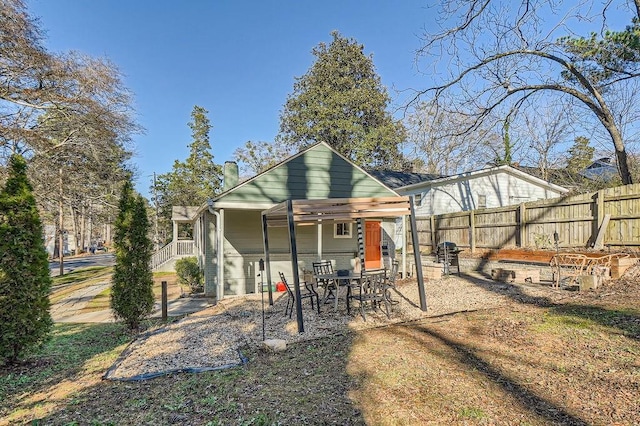 back of house featuring a patio area