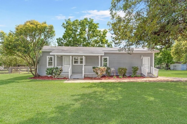 view of front of house featuring a front lawn and a porch