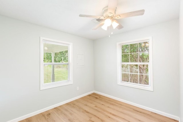 unfurnished room with ceiling fan and light hardwood / wood-style flooring