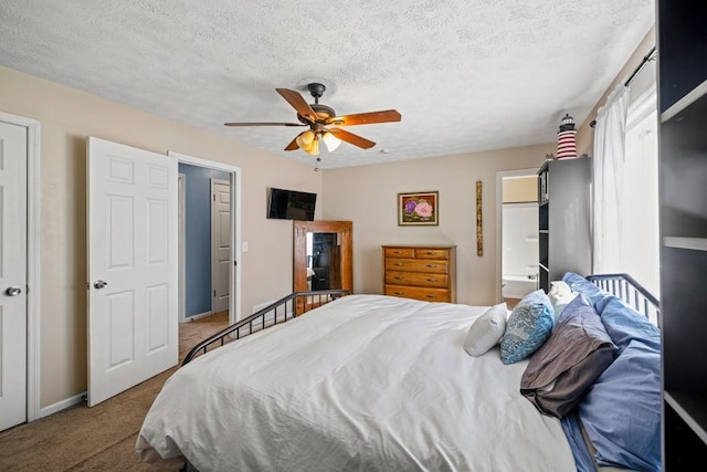 carpeted bedroom with a textured ceiling and ceiling fan