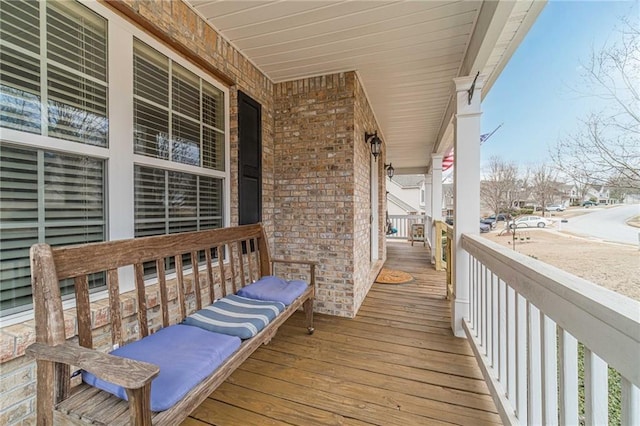 wooden deck featuring a porch