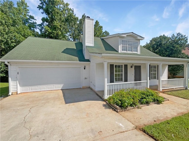 view of front of house featuring covered porch and a garage