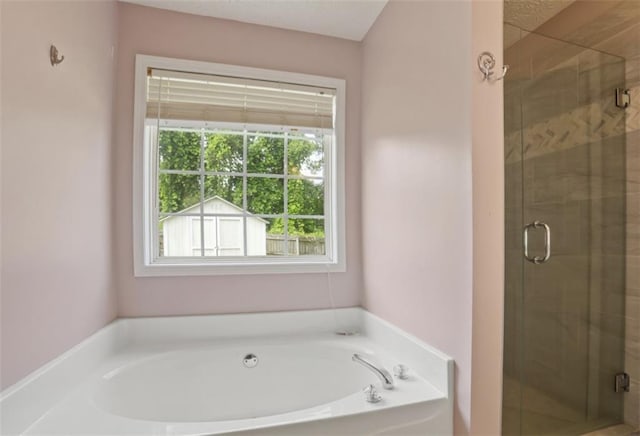 3971 Canebrake Ln, Douglasville, GA 30134 - full bathroom with a stall shower and a garden tub