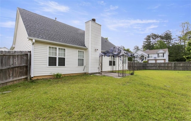 3971 Canebrake Ln, Douglasville, GA 30134 - rear view of house with a pergola, a chimney, a shingled roof, and a patio area