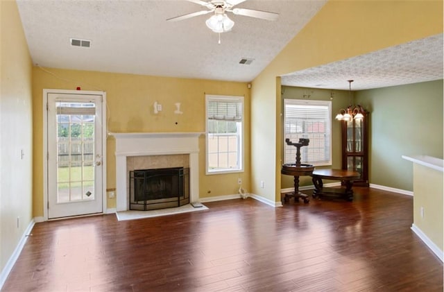 3971 Canebrake Ln, Douglasville, GA 30134 - living area with ceiling fan, wood finished floors, healthy amount of natural light, a premium fireplace, and vaulted ceiling