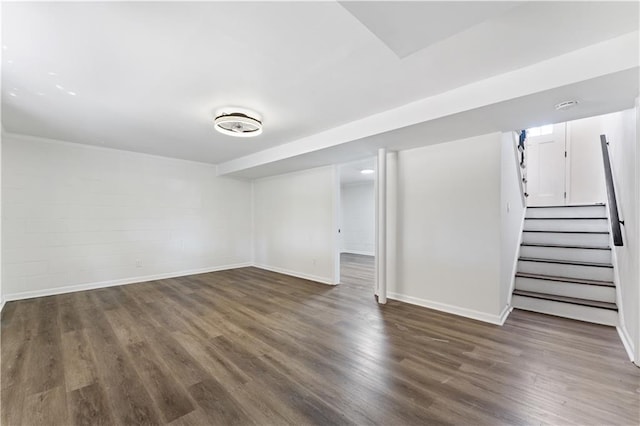 basement with dark wood-type flooring