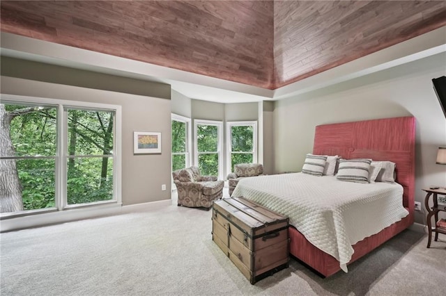 carpeted bedroom with baseboards