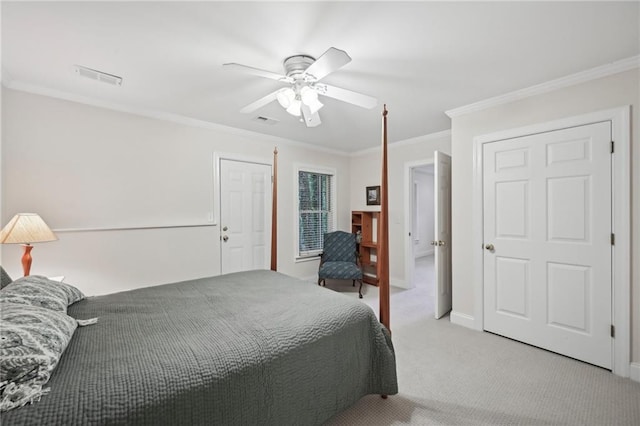 bedroom featuring ornamental molding, light carpet, baseboards, and a ceiling fan