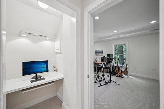 carpeted office featuring built in desk, recessed lighting, and baseboards