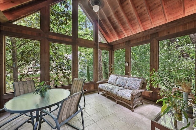sunroom / solarium with tile patterned flooring, healthy amount of natural light, an outdoor hangout area, wood ceiling, and wooden walls