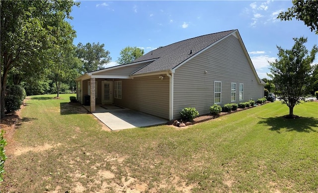 964 Village View Cir, Loganville, GA 30052 - view of property exterior with a patio, a yard, and a shingled roof