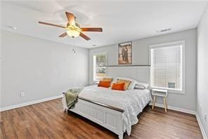 6547 River Station Dr, Lula, GA 30554 - bedroom featuring baseboards, wood finished floors, and ceiling fan