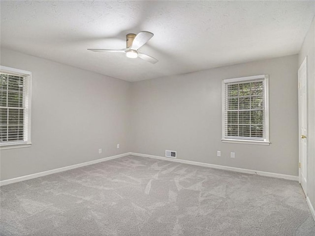 2544 Peyton Woods Trl SW, Atlanta, GA 30311 - carpeted empty room featuring ceiling fan, baseboards, and a textured ceiling