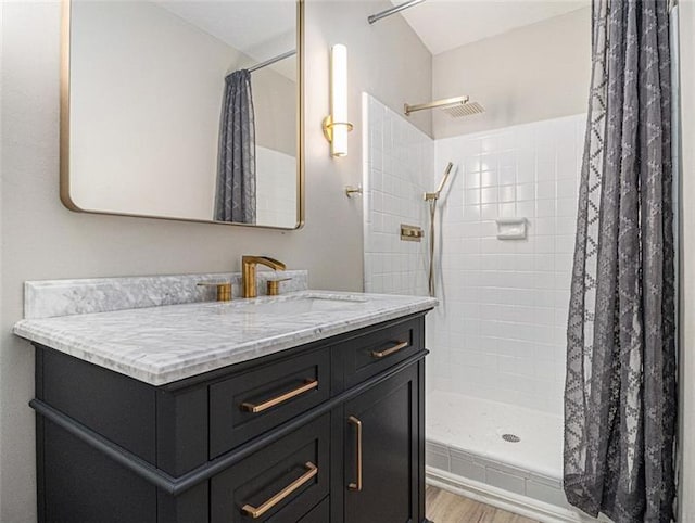 2544 Peyton Woods Trl SW, Atlanta, GA 30311 - bathroom featuring tiled shower, vanity, and wood finished floors