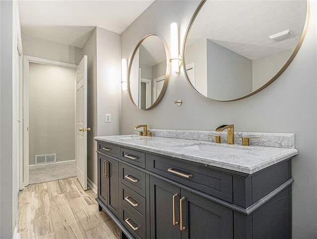 2544 Peyton Woods Trl SW, Atlanta, GA 30311 - bathroom with wood finished floors and double vanity