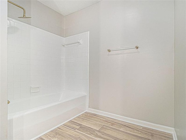 2544 Peyton Woods Trl SW, Atlanta, GA 30311 - full bath featuring wood finished floors, shower / bath combination, and baseboards