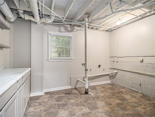 2544 Peyton Woods Trl SW, Atlanta, GA 30311 - basement featuring baseboards and stone finish floors
