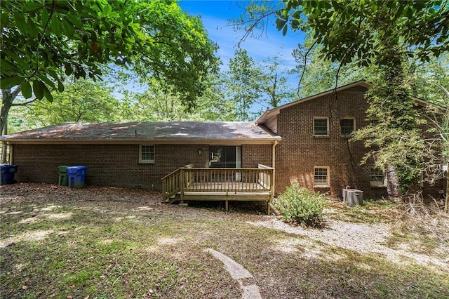 2544 Peyton Woods Trl SW, Atlanta, GA 30311 - rear view of property featuring a deck, brick siding, and cooling unit