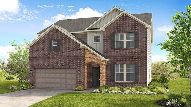 front of property featuring a garage and a front lawn