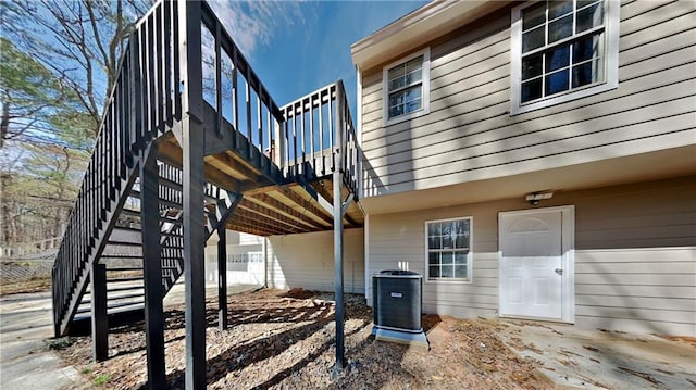 exterior space featuring a deck and central air condition unit