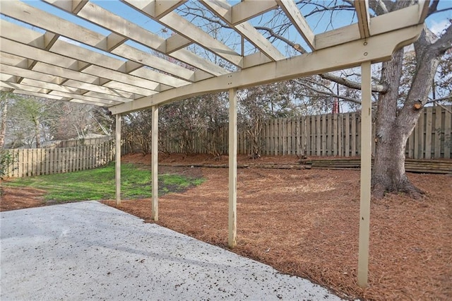 view of yard with a patio area, a pergola, and a fenced backyard