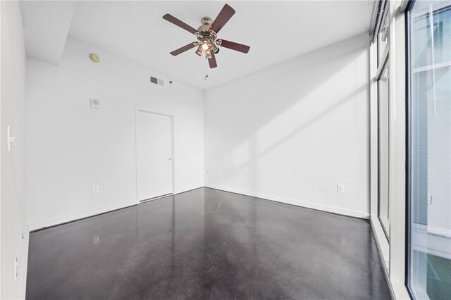 empty room featuring ceiling fan