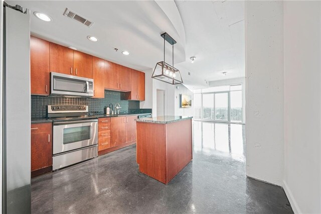 kitchen with a kitchen island, decorative light fixtures, stainless steel appliances, tasteful backsplash, and stone counters