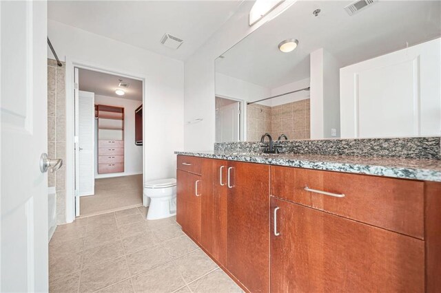 kitchen with a kitchen island, decorative light fixtures, stainless steel appliances, decorative backsplash, and sink