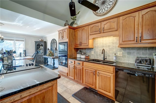 kitchen featuring sink, black appliances, dark stone counters, and light tile patterned flooring