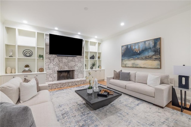 510 Northland Ridge Ct, Sandy Springs, GA 30342 - living room featuring wood finished floors, ornamental molding, a fireplace, recessed lighting, and built in shelves