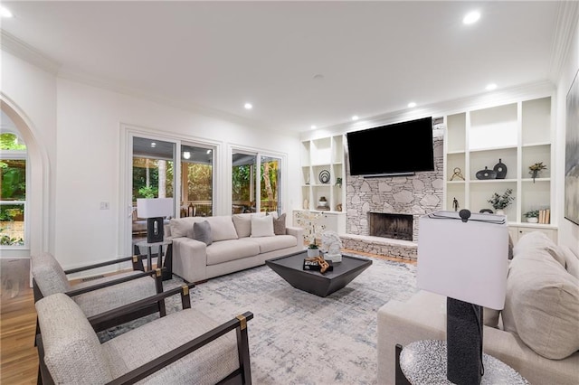 510 Northland Ridge Ct, Sandy Springs, GA 30342 - living area featuring crown molding, healthy amount of natural light, a fireplace, recessed lighting, and arched walkways