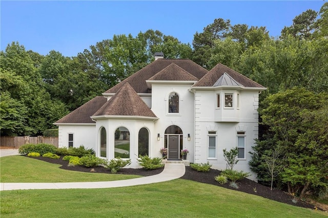 510 Northland Ridge Ct, Sandy Springs, GA 30342 - view of front of house with stucco siding, a chimney, and roof with shingles