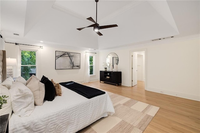 510 Northland Ridge Ct, Sandy Springs, GA 30342 - bedroom with light wood finished floors, ornamental molding, a raised ceiling, and ceiling fan