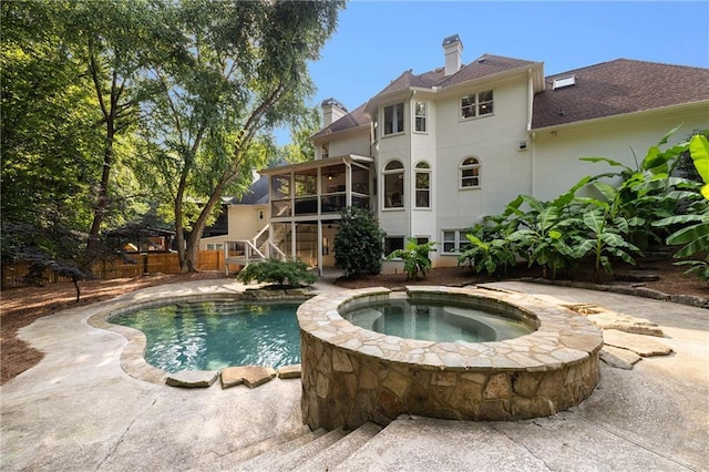 510 Northland Ridge Ct, Sandy Springs, GA 30342 - swimming pool featuring an in-ground hot tub, a sunroom, and a patio