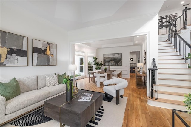 510 Northland Ridge Ct, Sandy Springs, GA 30342 - living area with stairway, ornamental molding, light wood-type flooring, and a raised ceiling