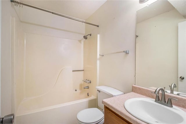full bathroom with bathing tub / shower combination, toilet, and vanity