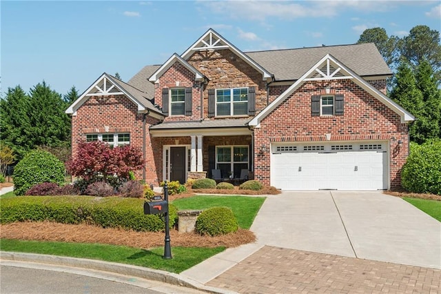 4650 Brighton View Trl, Cumming, GA 30040 - craftsman-style house with an attached garage, roof with shingles, driveway, and brick siding