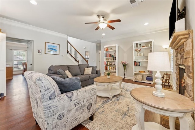 4650 Brighton View Trl, Cumming, GA 30040 - living room featuring ornamental molding, ceiling fan, wood finished floors, and a fireplace