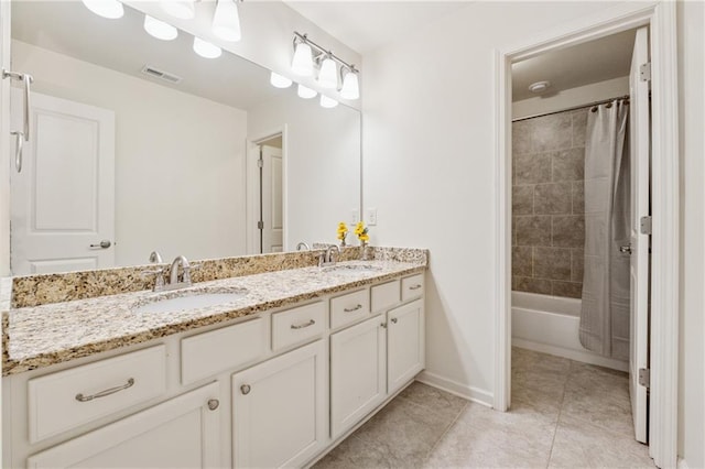 4650 Brighton View Trl, Cumming, GA 30040 - full bath with tile patterned flooring, double vanity, visible vents, and a sink