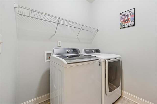 4650 Brighton View Trl, Cumming, GA 30040 - washroom with independent washer and dryer, laundry area, and baseboards