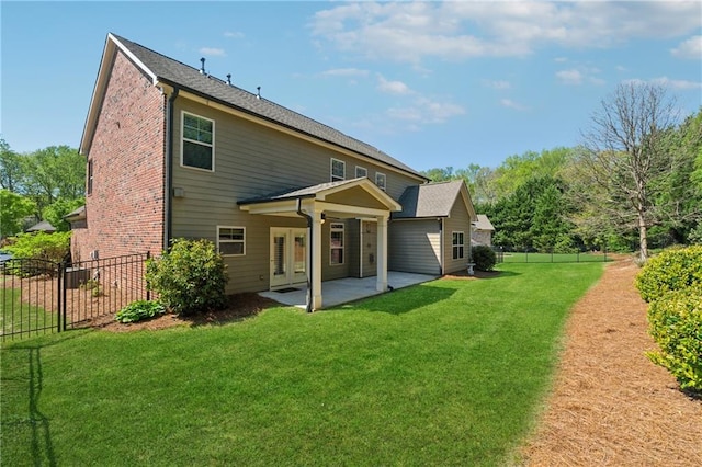 4650 Brighton View Trl, Cumming, GA 30040 - back of house with a patio area, brick siding, fence, and a lawn